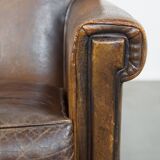 Sheepskin leather armchair with character and a touch of Art Deco design