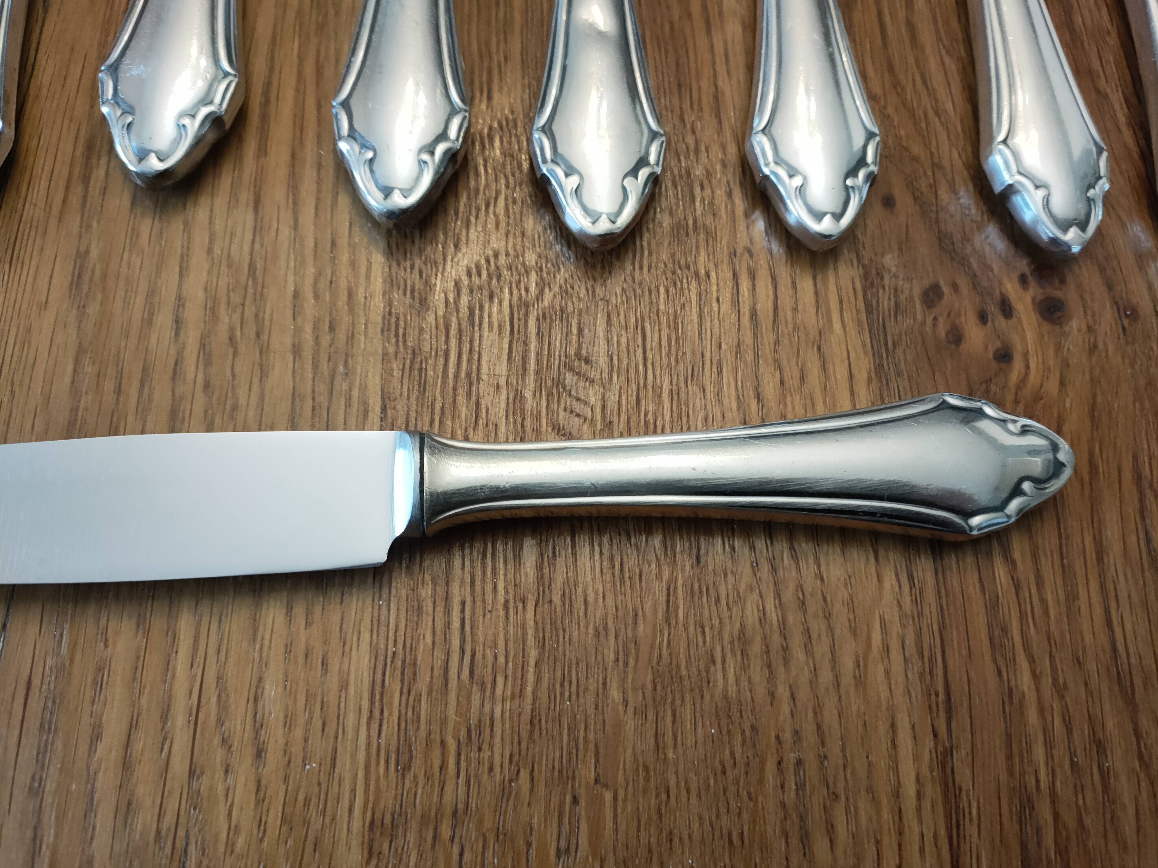 set of 11 silver metal cutlery