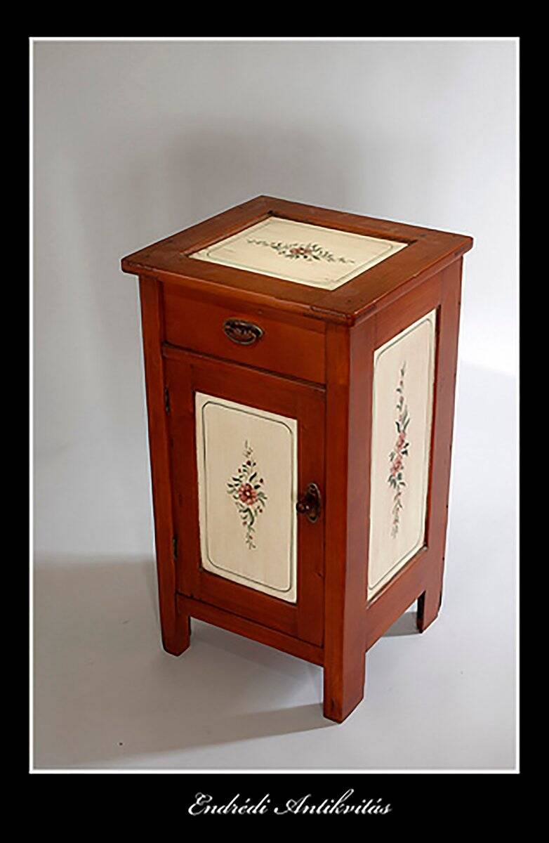 Vintage brown wooden bedside table hand-painted from the 1950s with a drawer and door.