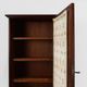 Armoire haute Art Déco française avec porte vitrée et compartiment caché, vers 1910