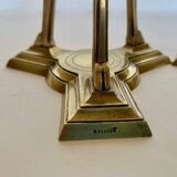 Pair of bronze tripod candlesticks,