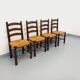 Set of 4 vintage brutalist chairs by Georges Robert in wood and straw.