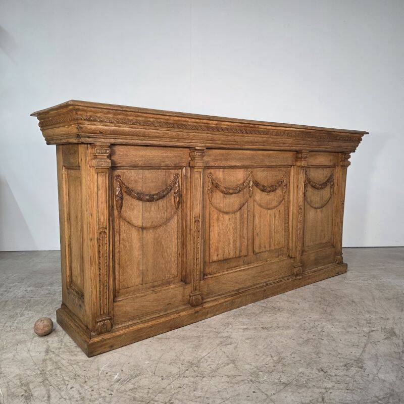 Important oak bar from a café around 1900.