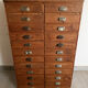 Old apothecary trade furniture in vintage wood 24 drawers.