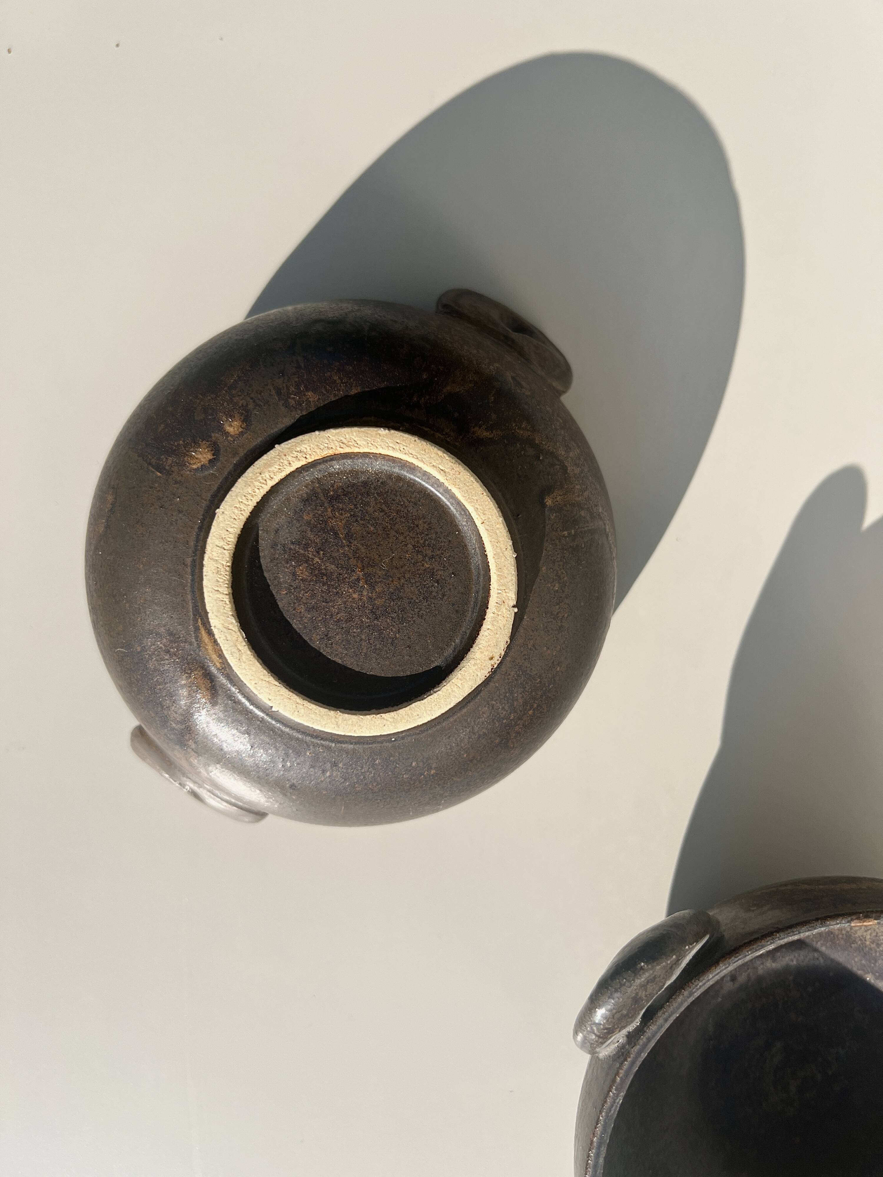 Pair of 2 handmade stoneware bowls, 20th century