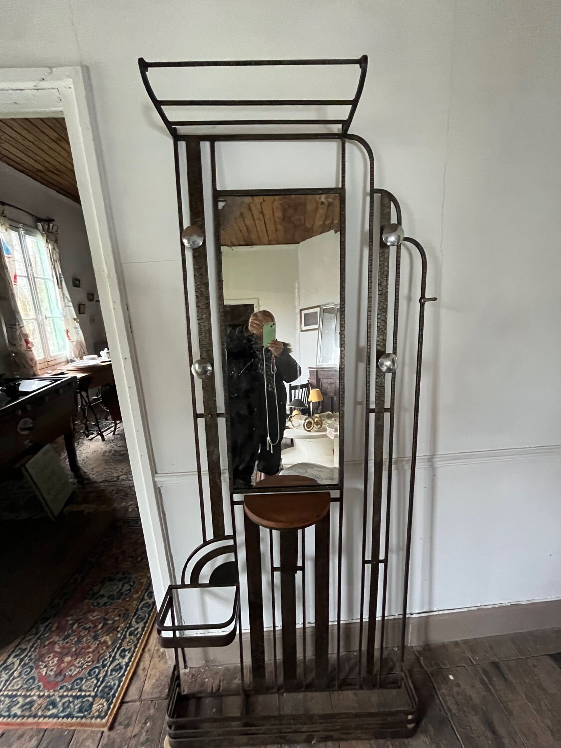 Wrought iron coat rack for the entrance