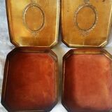 Ancient metal chocolate boxes with royal portraits