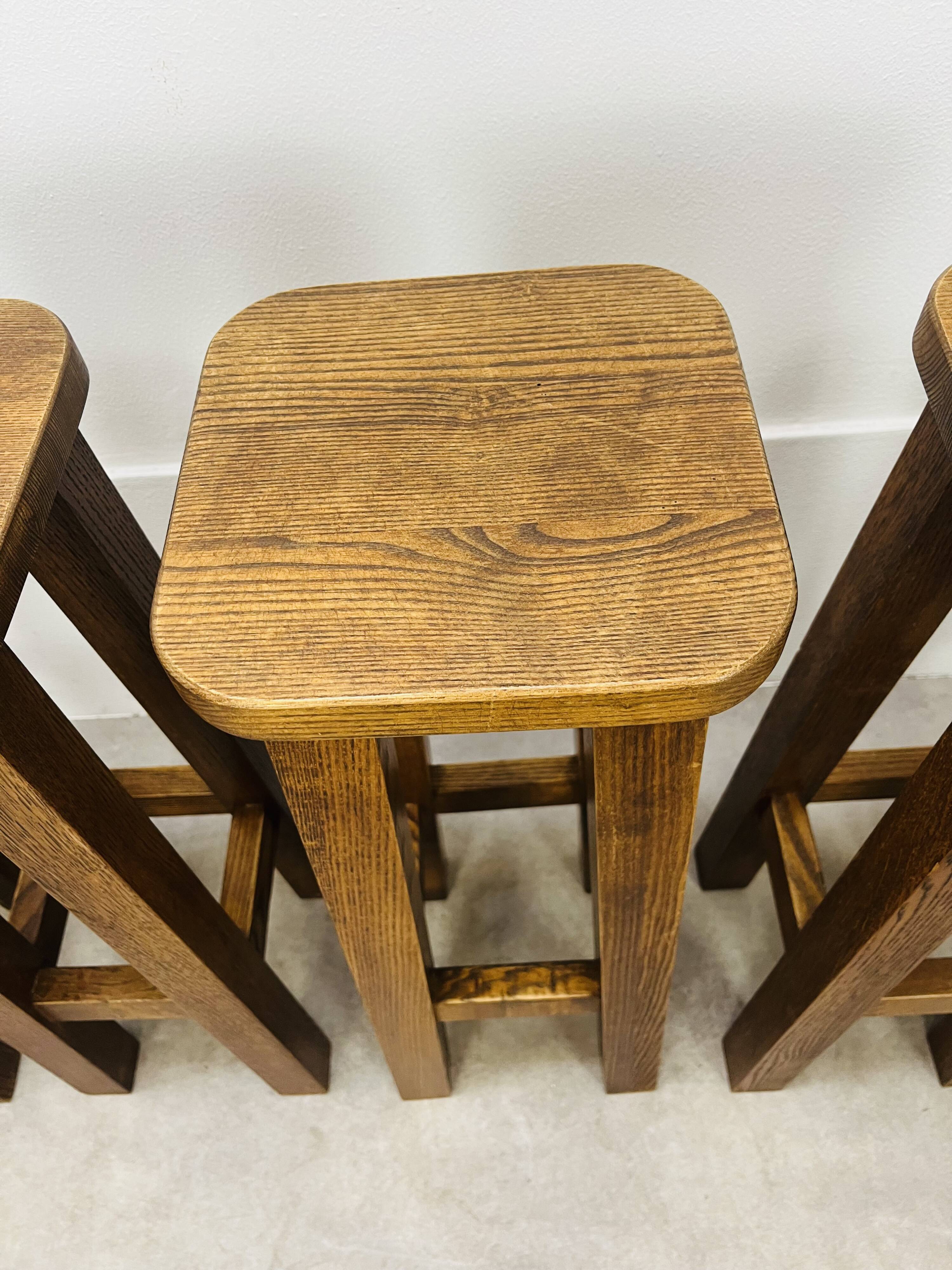 8 solid wood bar stools in brutalist style