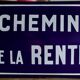 Old Enamelled and bulging "Chemin de la Rente" street plate, in perfect condition, on its cast iron support