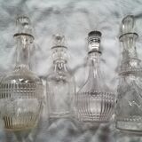 Set of four glass carafes