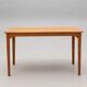 Vintage Scandinavian coffee table in walnut by Carl Malmsten - Sweden - 1960s