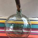 Former green glass demijohn