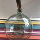 Former green glass demijohn