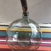 Former green glass demijohn