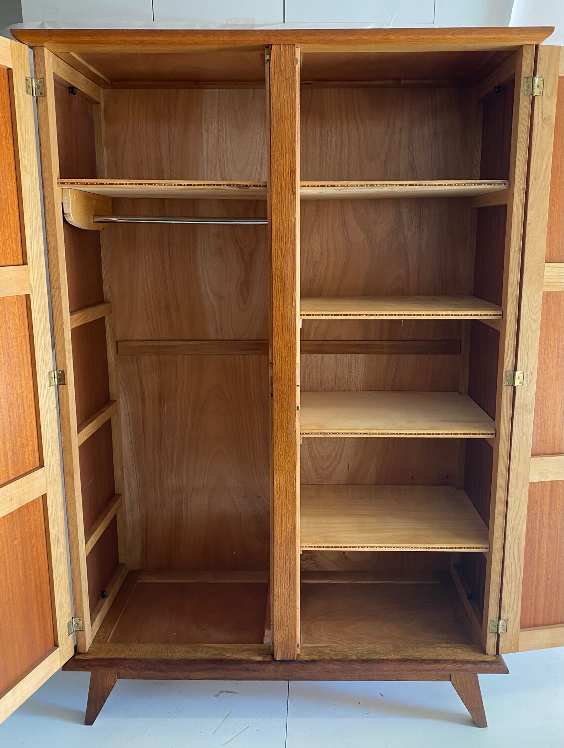 Vintage cupboard with compass feet