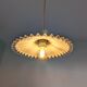Vintage suspension in lace opaline, elegant light fixture with soft light.