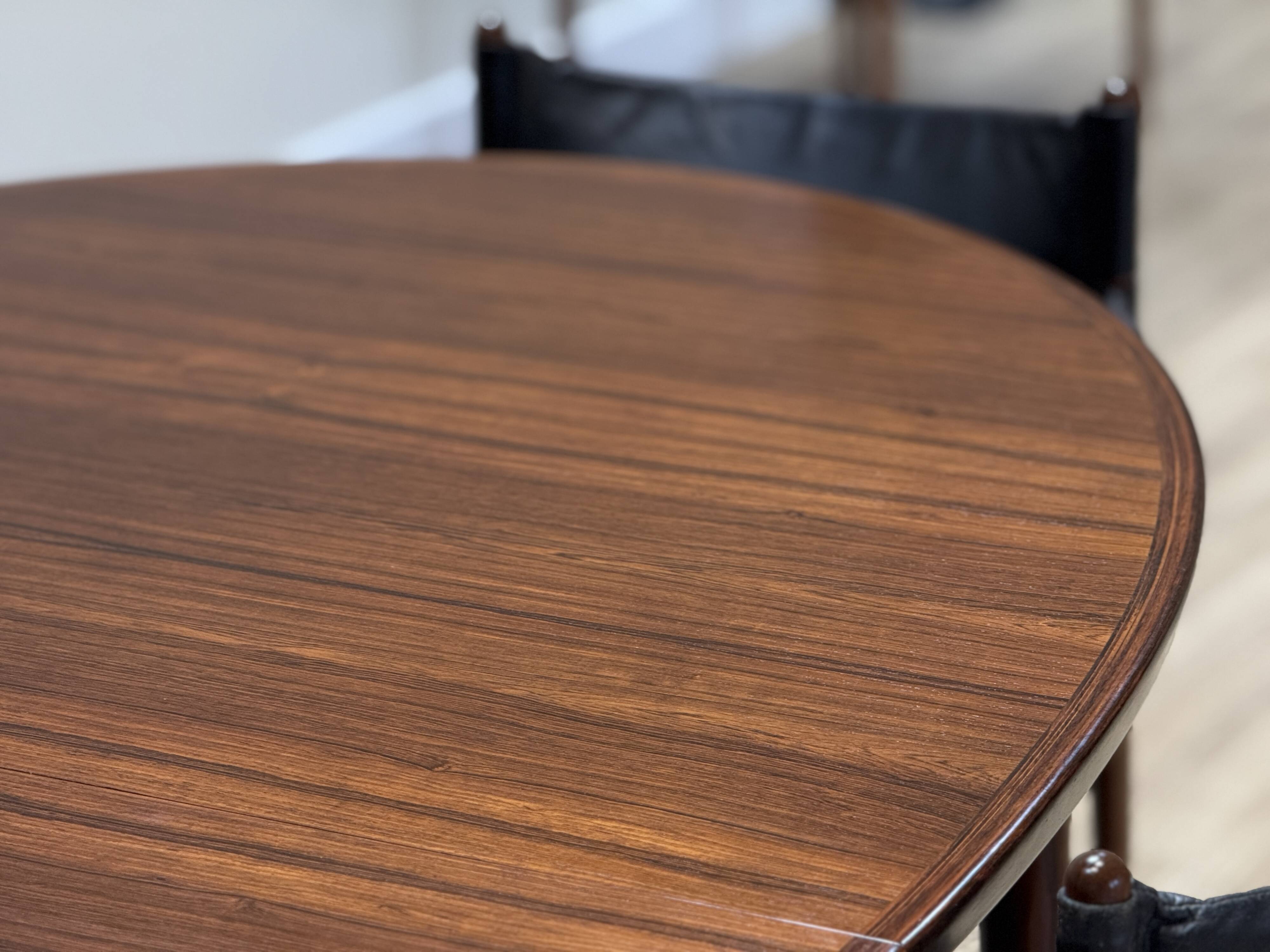 Extendable dining room table and chairs (by Kristian Solmer Vedel)