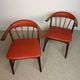 Pair of Scandinavian armchairs in teak and red faux leather – 1960s