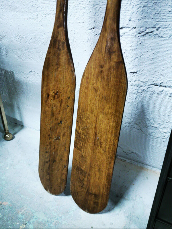 Pair of old wooden oars