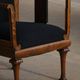 Early 20th century Danish Art Nouveau armchair, reupholstered in charcoal boucle.