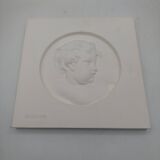 Portrait cast in low relief on plaster. SEDAP workshop.
