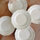 Set of 5 Sarreguemines ivory flat plates