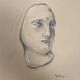 Signed drawing, charcoal study of a woman's face for workshop plaster.