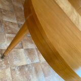 Extendable round cherry wood table