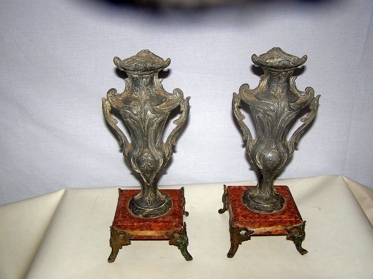 2 ancient amphorae in regulation on marble base