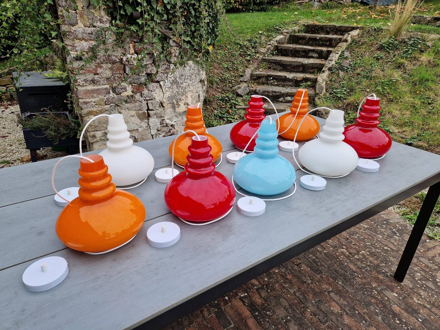 Trio of Space Age opaline pendant lights, Peill & Putzler, 1970