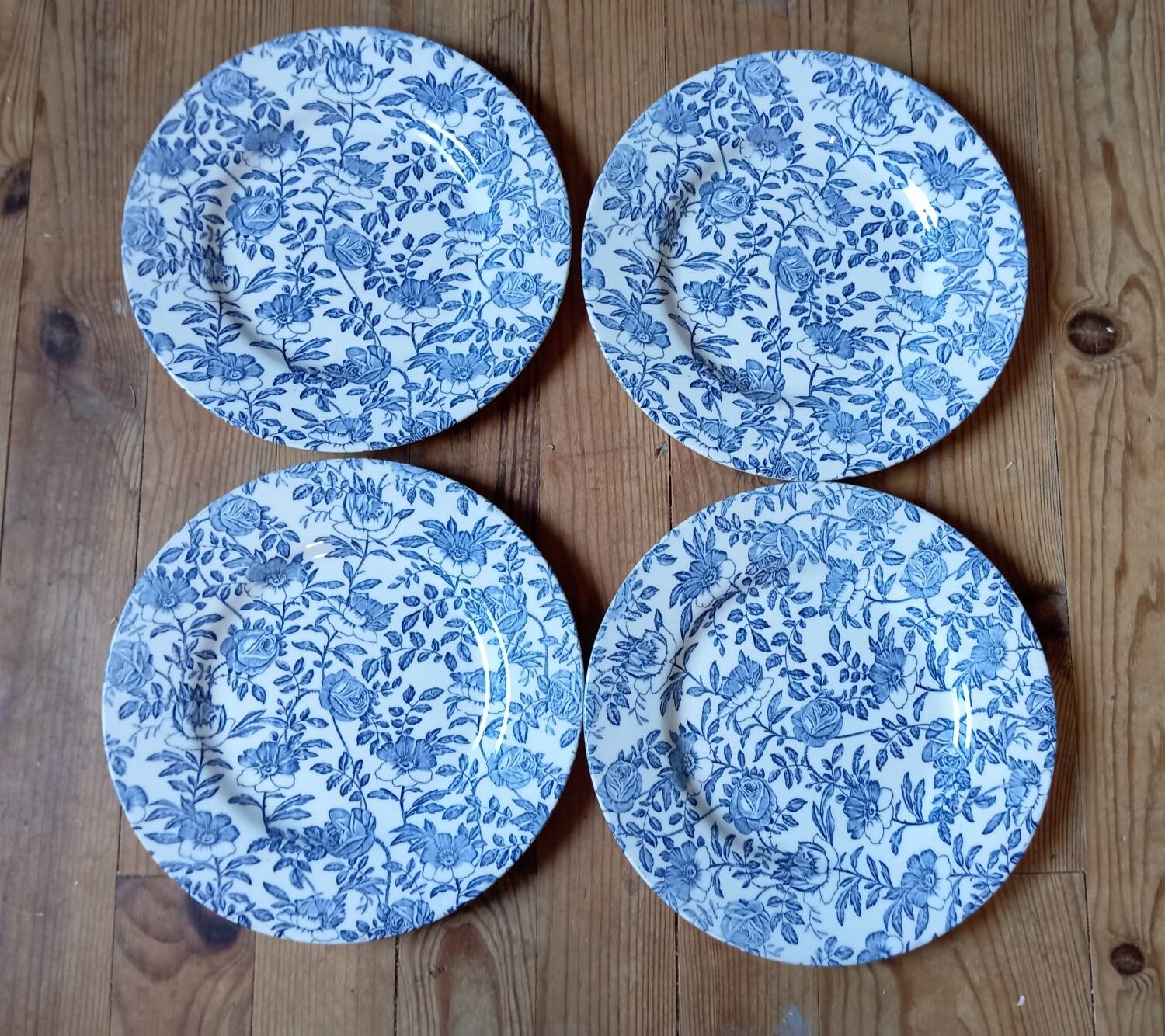 4 blue flower dinner plates, by Churchill - England