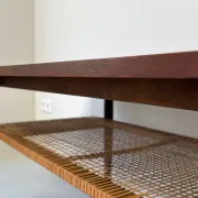 Vintage wooden coffee table with wicker lower shelf