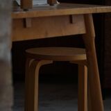 Alvar Aalto, a pair of vintage birch stools, model "60", made by Artek, 1970s.