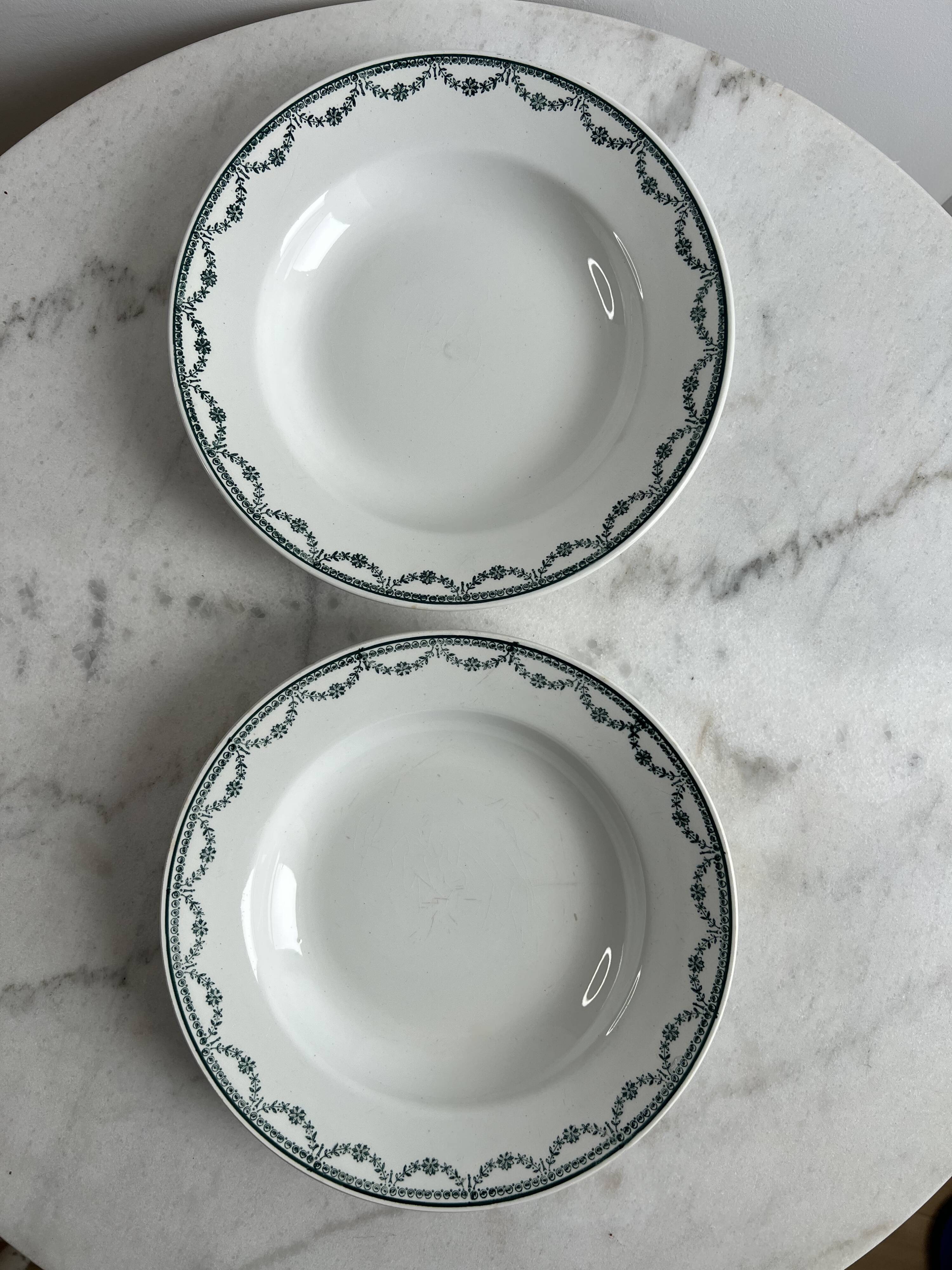 Set of two green frilled deep plates from Saint-Amand.