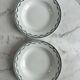 Set of two green frilled deep plates from Saint-Amand.