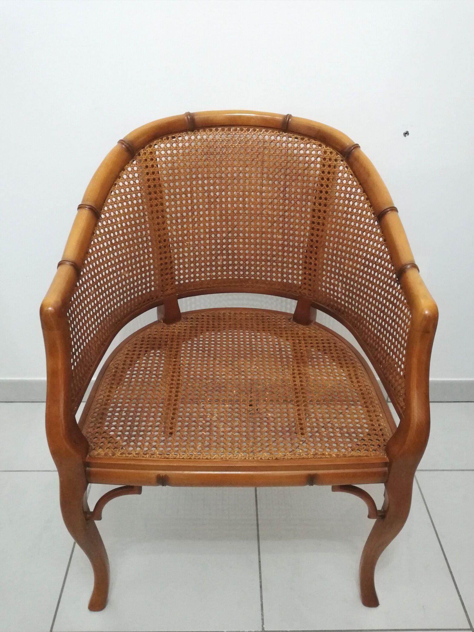 Fauteuil canné signé grange modèle faux bambou