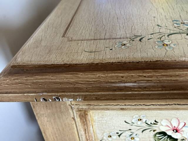 exotic wood console with a drawer