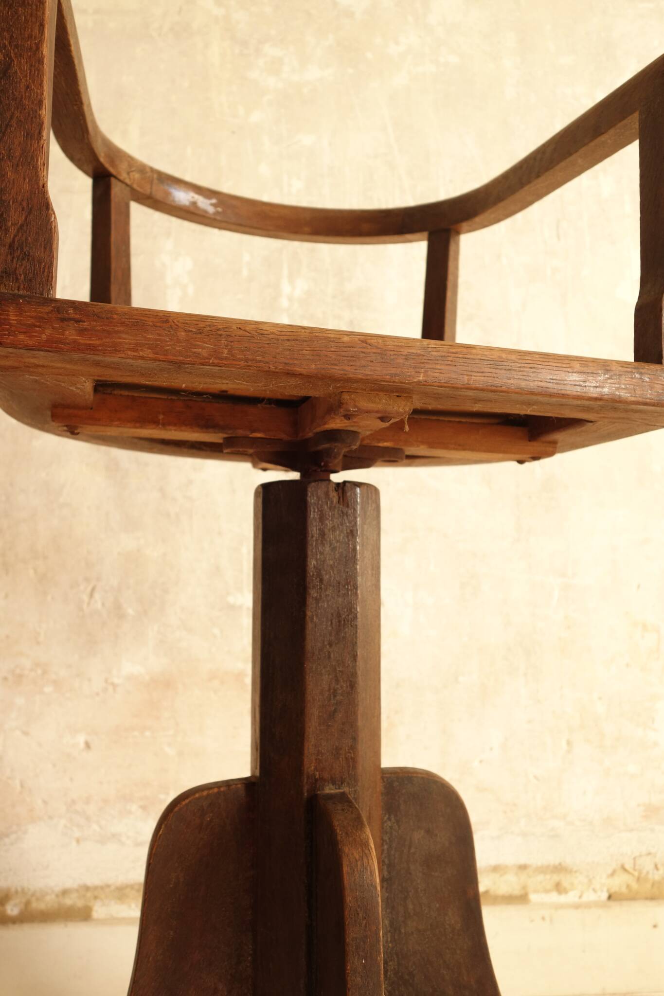 Antique wooden swivel chair