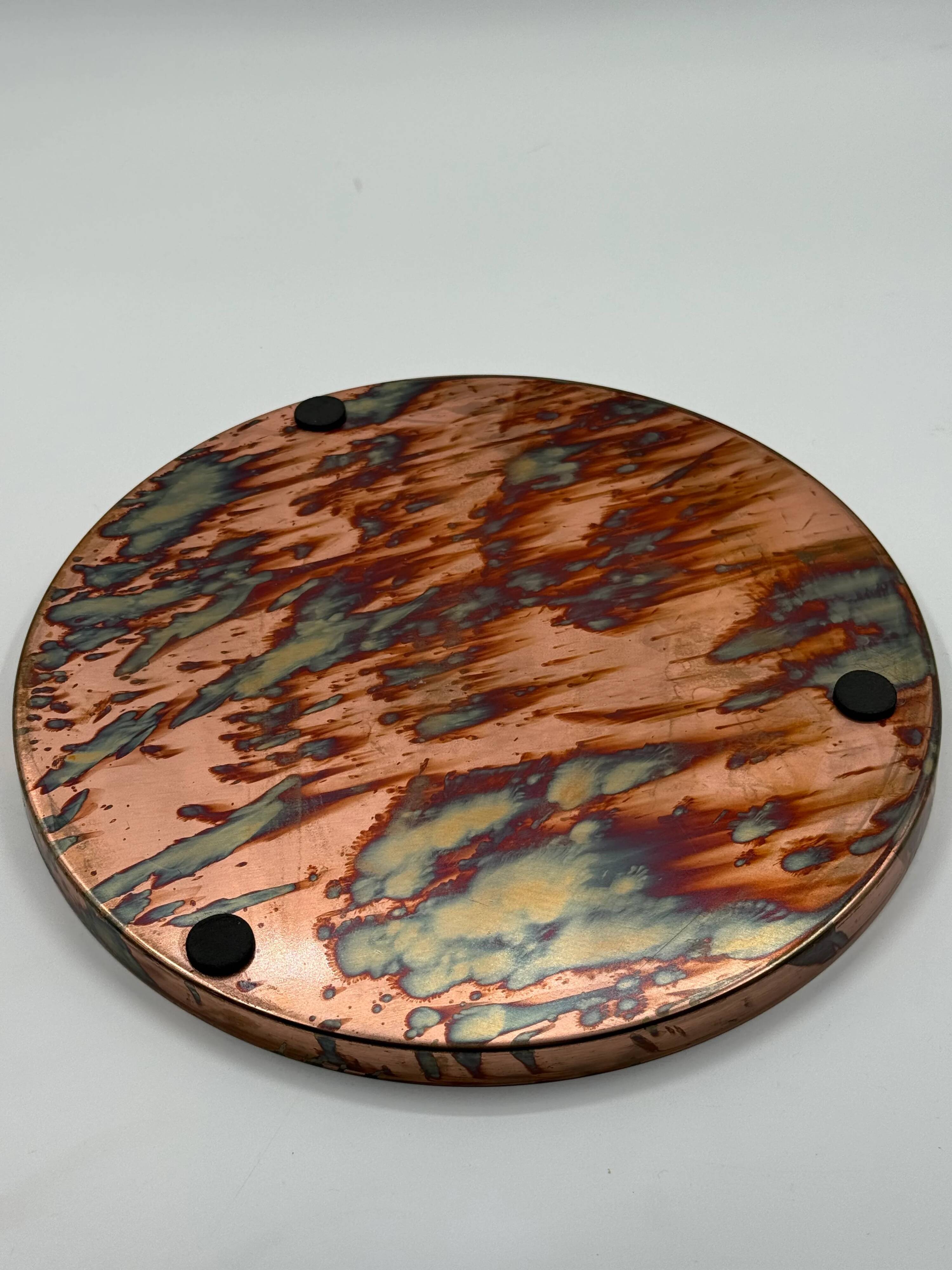 Round patinated copper platter, textured finish