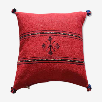 Red Berber cushion with cotton pompom