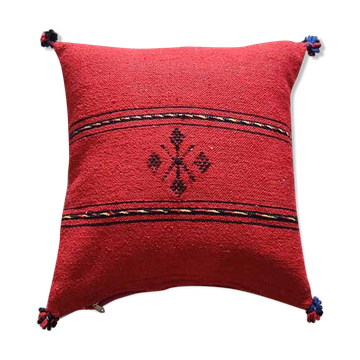 Red Berber cushion with cotton pompom