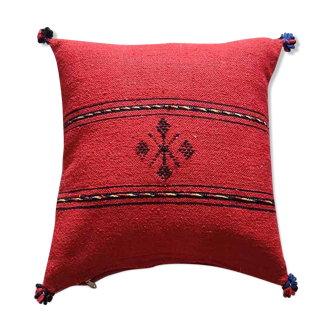 Red Berber cushion with cotton pompom