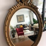 Ancien miroir ovale à fronton