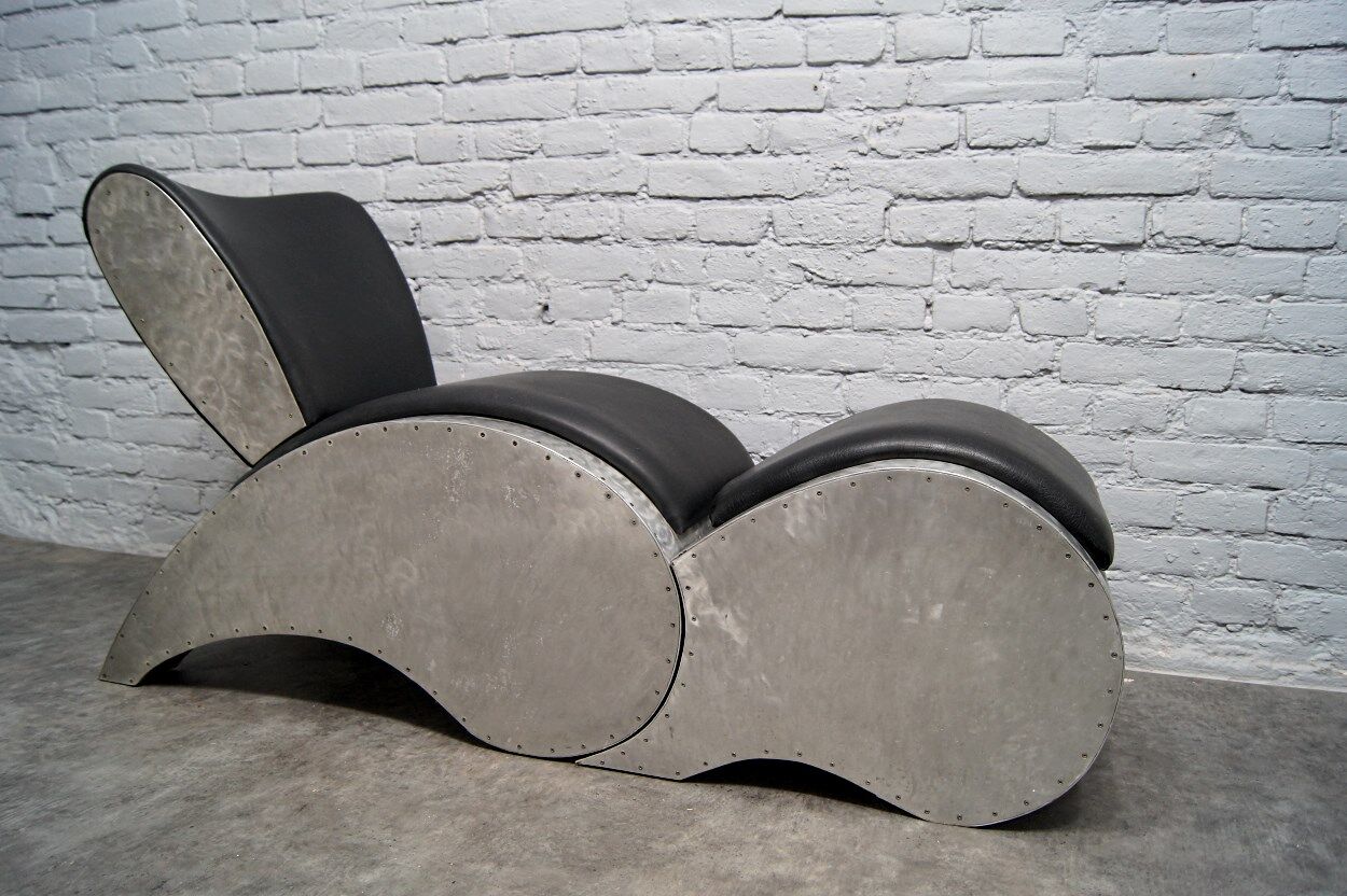 Industrial aluminum & vinyl lounge chair with footrest, 1970s