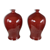 Paire de vases rouges en céramique, xxe siècle