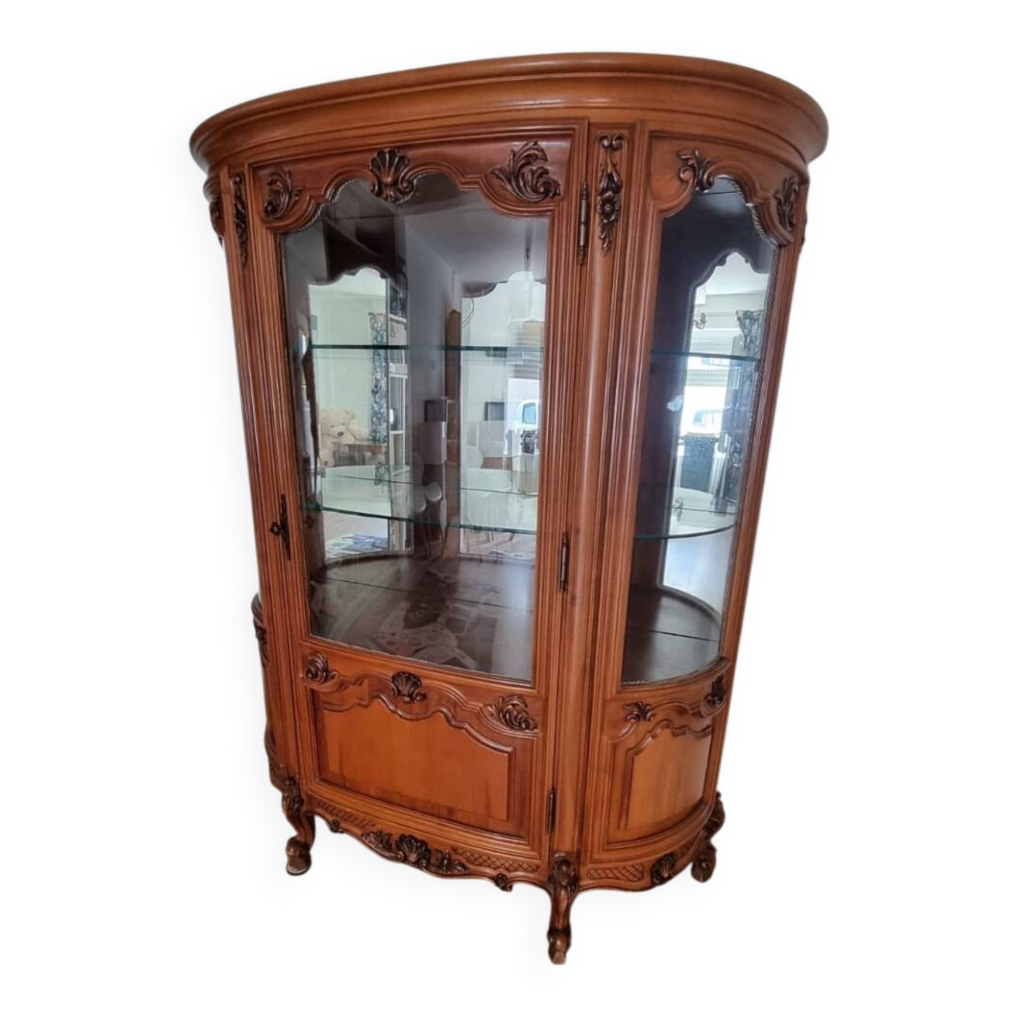 Silver display cabinet with a curved design.