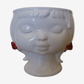 Vase shape young girl face
