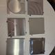 Set of 6 Space Age wall plaques, made of metal, geometric patterns.