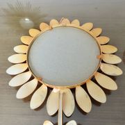 Grand miroir "fleur" 1970 en métal orange