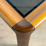 Square wooden coffee table with glass.